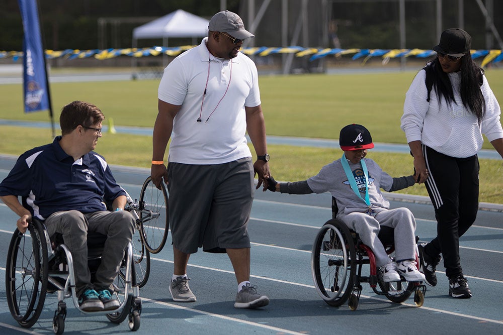 Athletes in wheelchairs on UCLA track and field