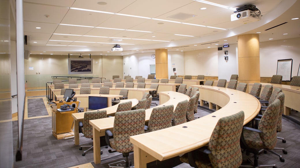 An empty large classroom space at UCLA Anderson