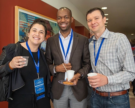 Three MBA students networking