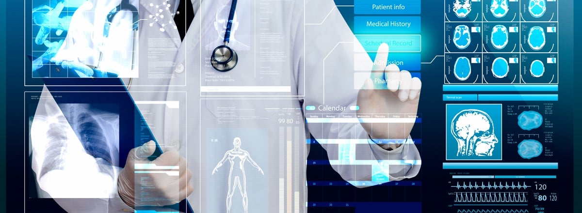 Doctor in a white coat using a holographic touch screen
