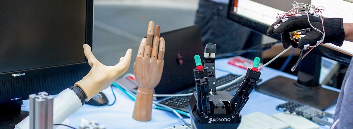 Robotic hands on a desk